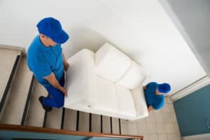 carrying a sofa down steps